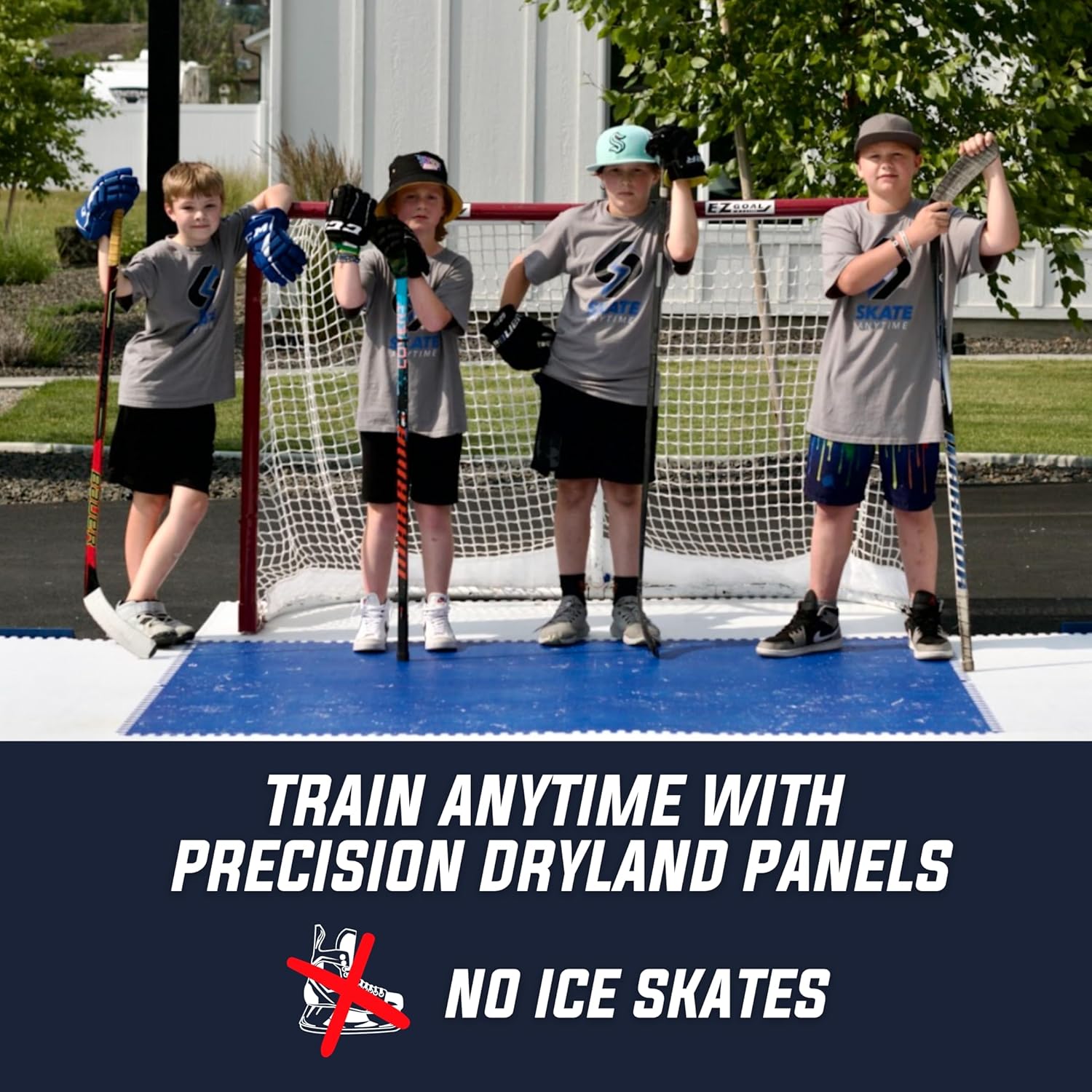 hockey setup with synthetic dryland tiles, stick, net, and training aids.